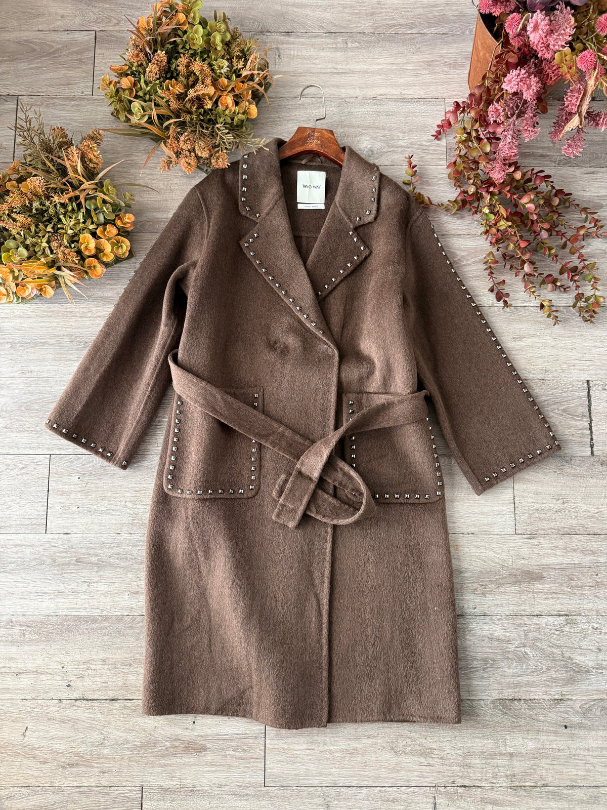 Cappotto borchiato