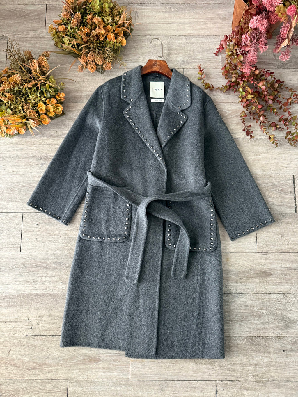 Cappotto borchiato