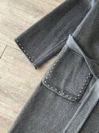 Cappotto borchiato